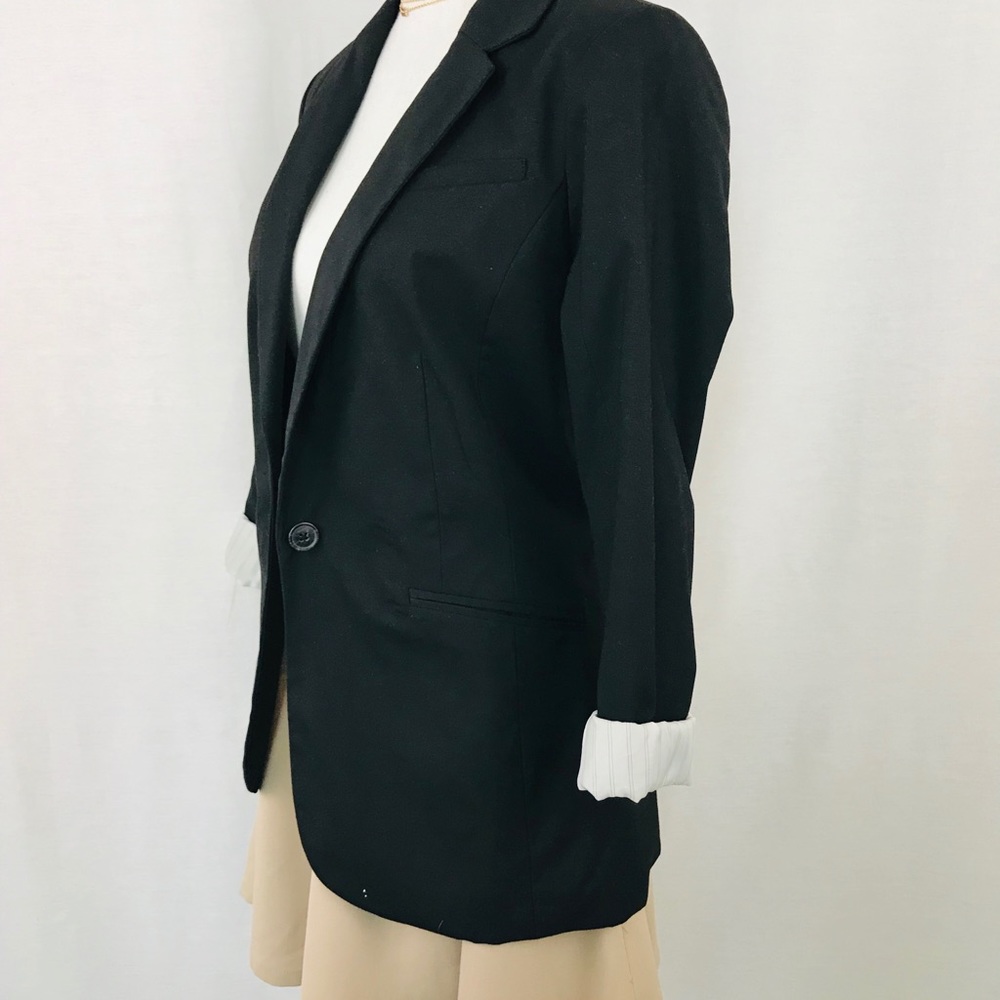 Oversized black blazer cuff detail